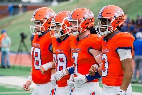 Central football captains (from left) Chase Cole, Kaden Rodgers, Mason Van Sickle and Christian English walk to midfield for the coin toss before their game against Abilene High on Friday, Aug. 30, 2024, at San Angelo Stadium.