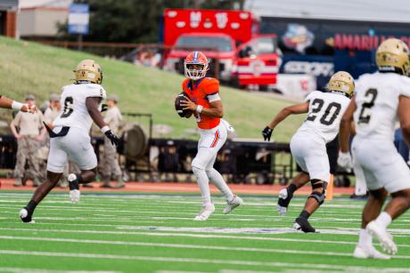 Central quarterback Christian English scans the defense against Abilene High on Friday, Aug. 30, 2024, at San Angelo Stadium.