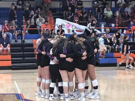 The Central High School volleyball team huddles before its match against Clyde on Tuesday, Sept. 17, 2024, at Central's Babe Didrikson Gym.