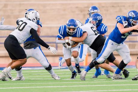 Lake View's Sammy Ramirez battles for yardage in the Chiefs' 55-42 win over Lamesa on Friday, Sept. 13, 2024, at San Angelo Stadium.