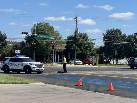 Drivers have been advised to avoid the intersection of Knickerbocker Road and Southland Boulevard due to a spill on the road causing low traction.