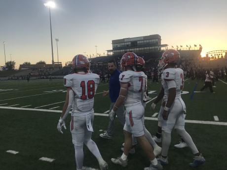 The Central Bobcats' captains prepare to walk to midfield before their game against Midland High on Friday, Oct. 25, 2024.