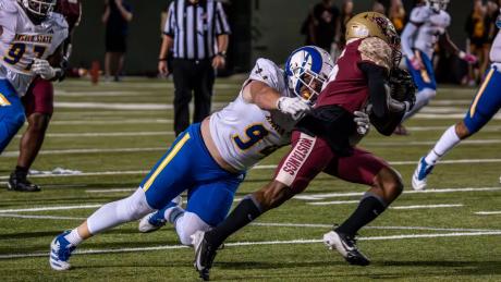 Angelo State's Owen Seaver brings down a Midwestern State player Saturday, Oct. 19, 2024, at Memorial Stadium in Wichita Falls.