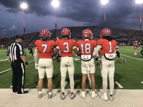 San Angelo Central captains Mason Van Sickle, Christian English, Jimmy Edwards and Zayden Norton prepare to walk to midfield for the coin toss against Odessa High on Friday, Nov. 1, 2024.