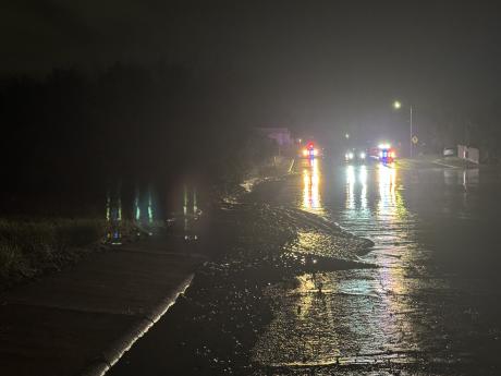 Emergency crews respond to a flooded roadway in San Angelo, where heavy rains have led to multiple water rescues across the city.