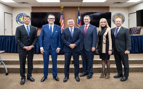 (Pictured left to right: Commissioner Hord, Commissioner Stodghill, Deputy Director Freeman Martin, Chairman Mach, Commissioner Blair and Commissioner Long)