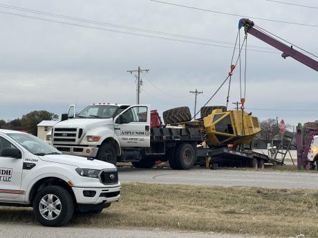 A piece of heavy machinery tipped over on Highway 67 Wednesday afternoon, temporarily shutting down traffic in both directions near Miles.
