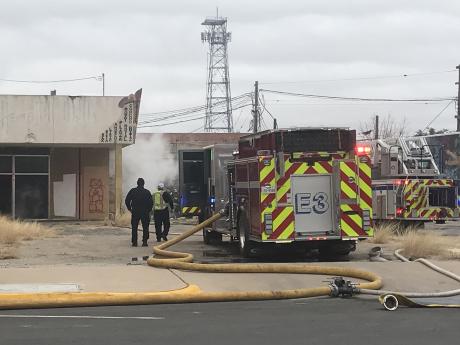 A fire in an abandoned building downtown Tuesday morning caused Twohig Avenue to be shut down to traffic between Chadbourne and Irving streets.