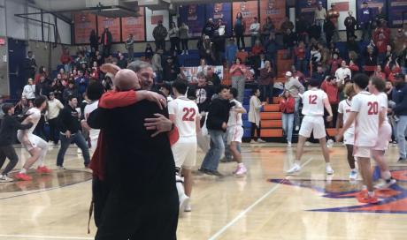 The Miles Bulldogs celebrate after defeating Christoval 66-65 in the opening round of the playoffs Tuesday, Feb. 18, 2025.