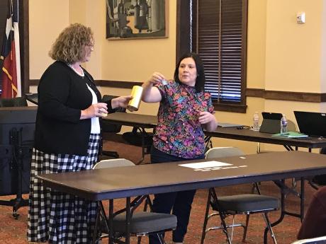City Clerk Heather Stastny draws names to determine the ballot order for San Angelo’s upcoming May 3 election during a drawing held on Monday, Feb. 24.