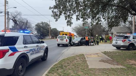 Two people were hospitalized Friday after a two-vehicle collision at the intersection of Paint Rock Road and Sellers Street.