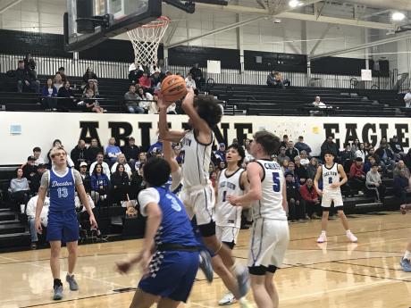 Lake View junior guard Braylon White drives to the basket against Decatur in their second-round playoff game Friday, Feb. 21, 2025.