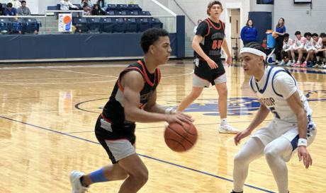 Central Bobcats' Christian English and Jax Olson in action against El Paso Eastwood