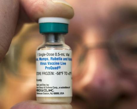 A dose of the measles-mumps-rubella (MMR) vaccine.