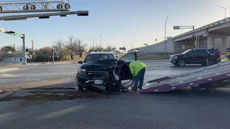 A crash at the intersection of North Bryant Boulevard and West 6th Street sent at least one person to the hospital and shut down southbound lanes Friday morning.