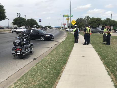 A driver involved in a crash late Wednesday morning sped away from the scene while accidentally leaving their license plate lying on the road.