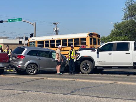 A five-vehicle crash at a busy intersection caused a traffic headache Friday morning.