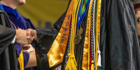 ASU Graduate with Alpha Chi Medal