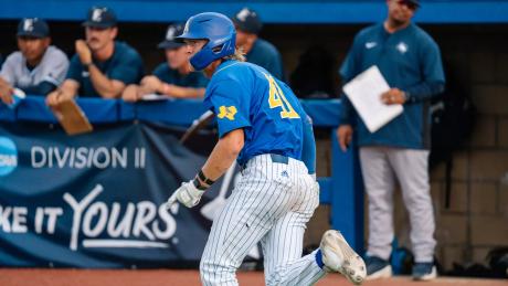 Angelo State's Justin Harris scored the game's only run in the Rams' 1-o win over St. Edward's on Friday.