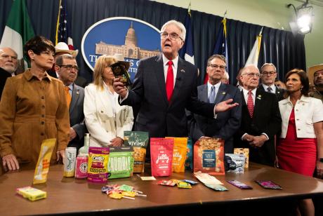 Lt. Gov. Dan Patrick speaks about Senate Bill 3 during a press conference in the Texas Capitol on May 28, 2025. Patrick, flanked by state lawmakers, argued the bill's ban on THC products would be a service to Texans, saving their lives. Credit: Lorianne Willett/The Texas Tribune