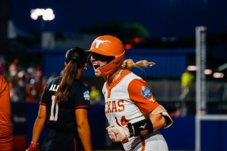 The University of Texas softball team found a way to break through against Texas Tech ace NiJaree Canady for a wild 2-1 win Wednesday in Game 1 of the Women’s College World Series.