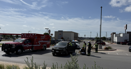 A two-vehicle crash on private property Friday in San Angelo sent a woman to the hospital.