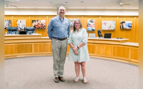 Santa Rita Elementary teacher Lynn Springer, San Angelo ISD’s 2024 Elementary Teacher of the Year, stands with Superintendent Dr. Chris Moran following her recognition at the June 16 school board meeting. (Photo by: San Angelo ISD)