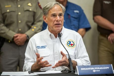 Gov. Greg Abbott speaks at a press conference at the Hill Country Youth Event Center in Kerrville on Saturday, July 5, 2025.