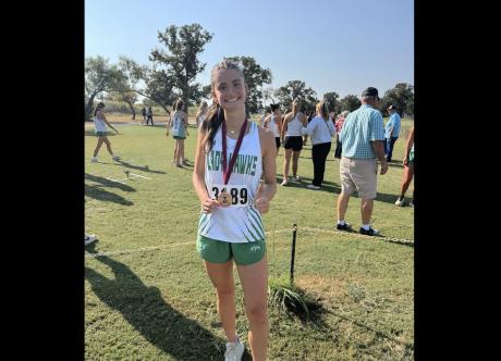Wall High School junior Mckenzie Lopez broke a 17-year-old school record Wednesday at a cross country meet in Hawley.