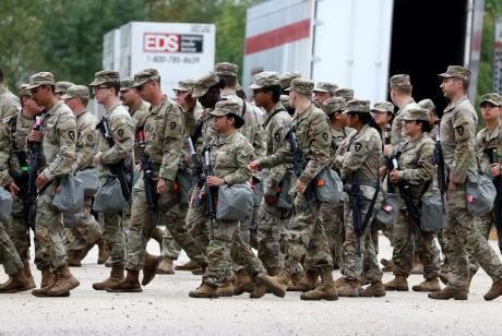 Members of the Texas National Guard assemble in Elwood, Illinois, at the Army Reserve Training Center in the southwest suburb of Chicago on Oct. 7, 2025.
