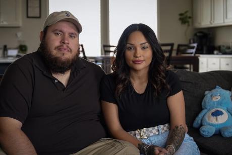 Alfredo and Daniela Santos in their home in Midland on Monday. Their child was allegedly restrained and neglected in their classroom. Credit: Rikki Delgado for The Texas Tribune