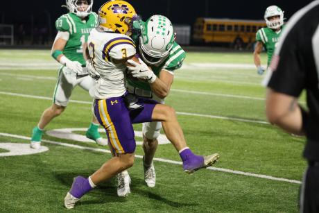Wall's Levi King tackles Merkel's C.J. Guadarrama during their game Friday, Oct. 10, 2025.