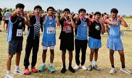 San Angelo TLCA’s Zechariah Cuevas (center) set a school record Wednesday at the District 6-3A Cross Country Meet.