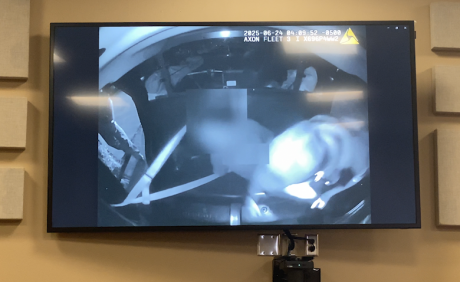 Video of Officer Jason Gann and a restrained woman