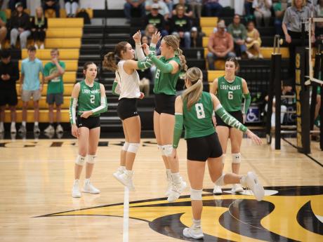 The Wall Lady Hawks celebrate a point during their regional semifinal win over Idalou on Thursday, Nov. 6, 2025.