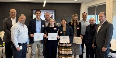 ASU Team (with certificates, L-R) Andres Ybarra, Katelyn St. John, Tatiana Alvarez and Ava James; Dr. Jeremy St. John (back row middle) and the contest judges. 