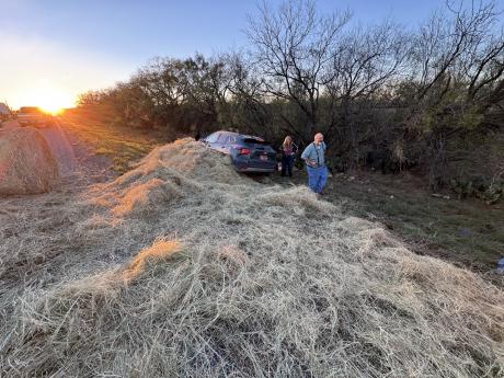 Hay bales that fell from a farmer’s truck caused a crash on US Highway 67 outside the town of Miles on Friday evening.