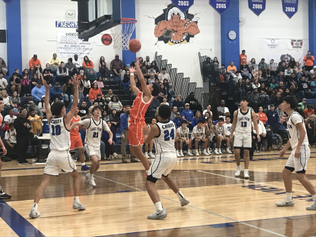 Central's Trey Allen lays the ball up in traffic in the Bobcats' win over Lake View in the Doug McCutchen Tournament championship game Saturday, Dec. 6, 2025.