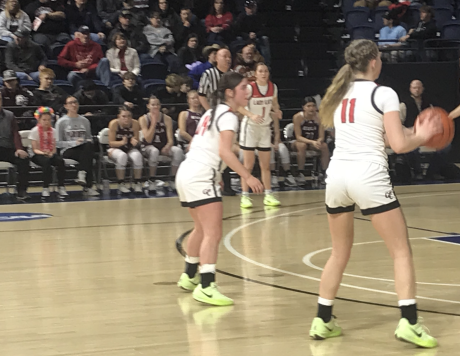 Garden City's girls basketball team in action in a 2025 playoff game against Eula.