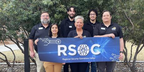 (Back L-R) Russell Ezzell, RSOC manager; Nic Diaz, cyber engineer; Gideon McMickle, cyber engineer - (Front L-R) Hailey Lowden, cyber engineer; Becky Bray, procurement specialist; Kolten Sinclair, cyber engineering team lead. 
