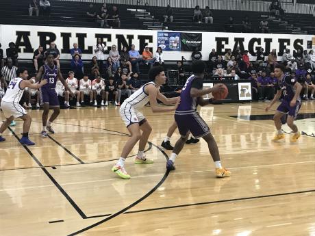San Angelo Central's TK Taylor defends Crowley's Collin King Sumberlin in their second-round playoff game Friday, Feb. 27, 2026.