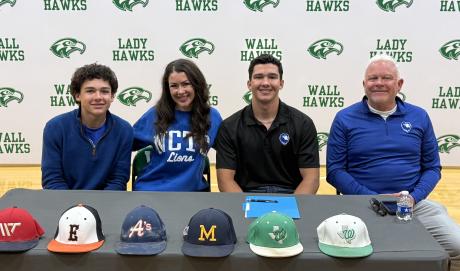 Wall Hawks' Gage Reichenau and his family at his signing day at Wall High School