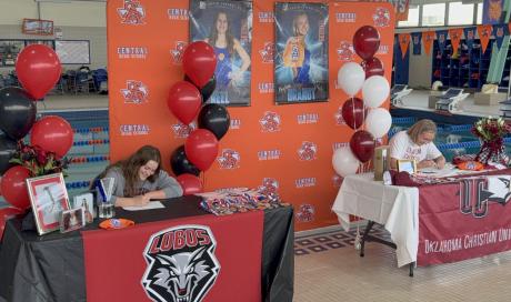 Central's Elsa Reel and Peyton Brandt sign to swim at the collegiate level.