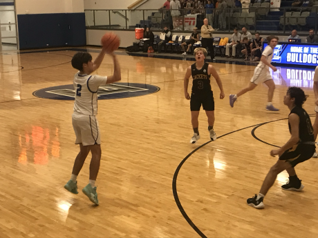 Eden's Avery Condarco knocks down one of his five 3-pointers in the Bulldogs' 50-24 win over Menard on Tuesday, Feb. 3, 2026.