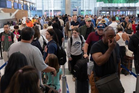 Travelers wait for hours in long TSA lines at the George Bush Intercontinental Airport in Houston on March 25, 2026. REUTERS/Antranik Tavitian