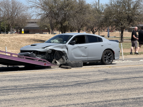 A two-vehicle collision Thursday afternoon in front of Goodfellow Air Force Base has reduced outgoing traffic to one lane.