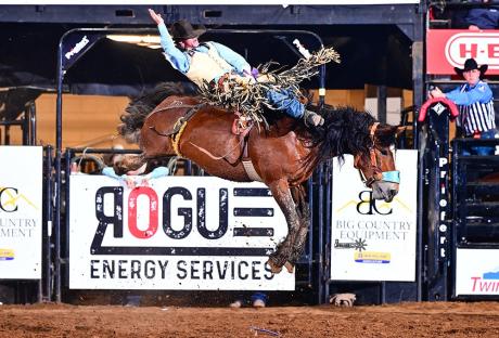 Australia's Toby Deudney had an electrifying ride to score 93 points and win the bareback title Saturday at the San Angelo Rodeo's Cinch Chute-Out.