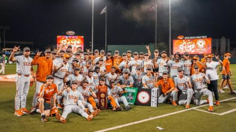 The Texas Longhorns baseball team celebrates after its 6-5 win over Oregon to advance to the 2026 College Baseball World Series.