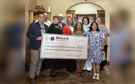 TWC Chairman Joe Esparza and local partners attend big check ceremony.