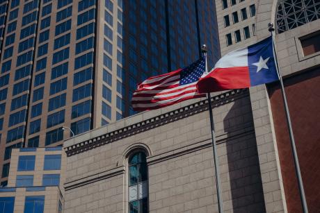 The American and Texas flags over Comerica Bank in downtown Dallas on Feb. 17, 2026.